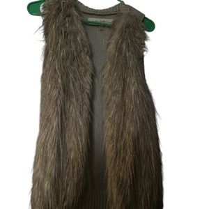 Size small furry tan vest